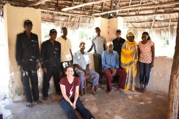 Figure One. The community elders and security staff at Songa Mnara, along with York team leader Dr Stephanie Wynne- Jones and UDSM student Joyce Mreta. (Photo credit Ashley Fisher)  Picha 1: Wazee wa kijiji wakiwa na walinzi kutoka Songo Mnara, pamoja na timu kutoka York ikiongozwa na Dr. Stephanie Wynne-Jones na mwanafunzi mtafiti kutoka Chuo Kikuu cha Dar es Salaam Joyce Mreta  (picha Ashley Fisher)